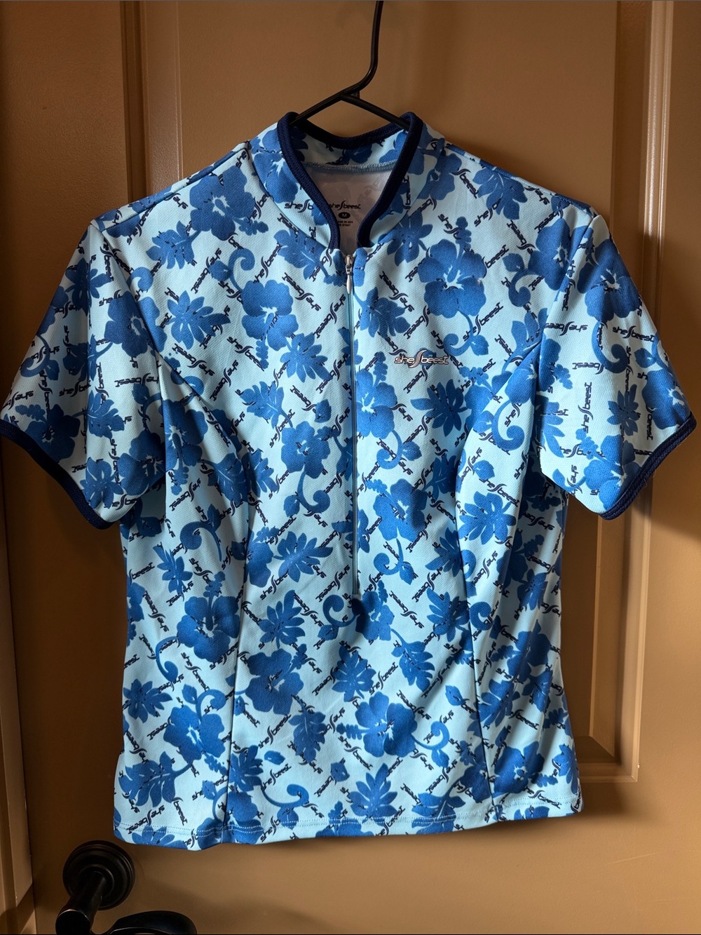 shebeest Light Blue Floral Zip-Front Cycling Jersey with Navy Trim